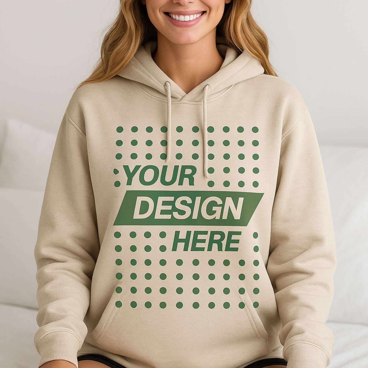 Woman wearing beige custom hoodie with “Your Design Here” print – design your own women’s hoodie in Canada with CZORZ’s premium T-shirt printing and no minimum order.
