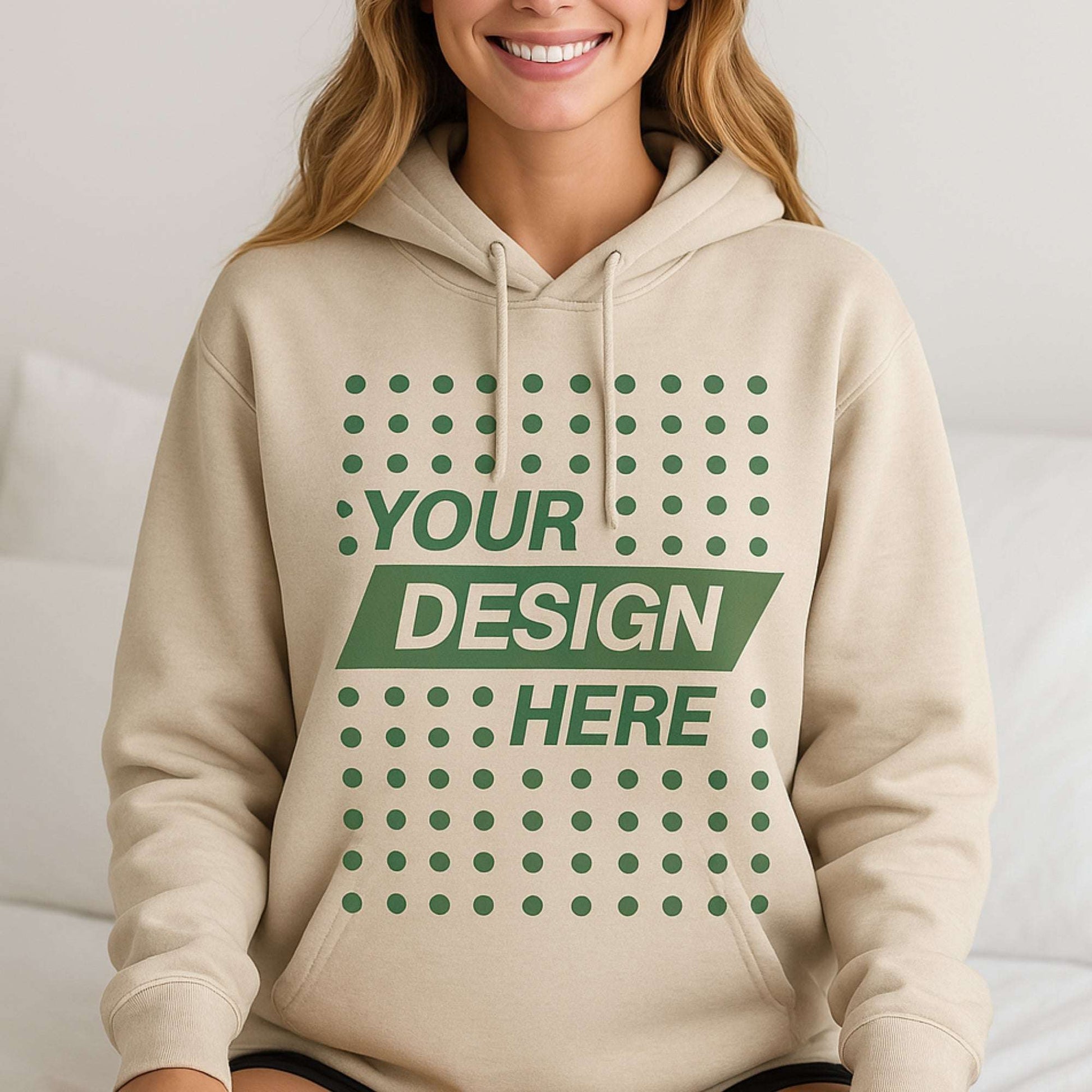 Woman wearing beige custom hoodie with “Your Design Here” print – design your own women’s hoodie in Canada with CZORZ’s premium T-shirt printing and no minimum order.