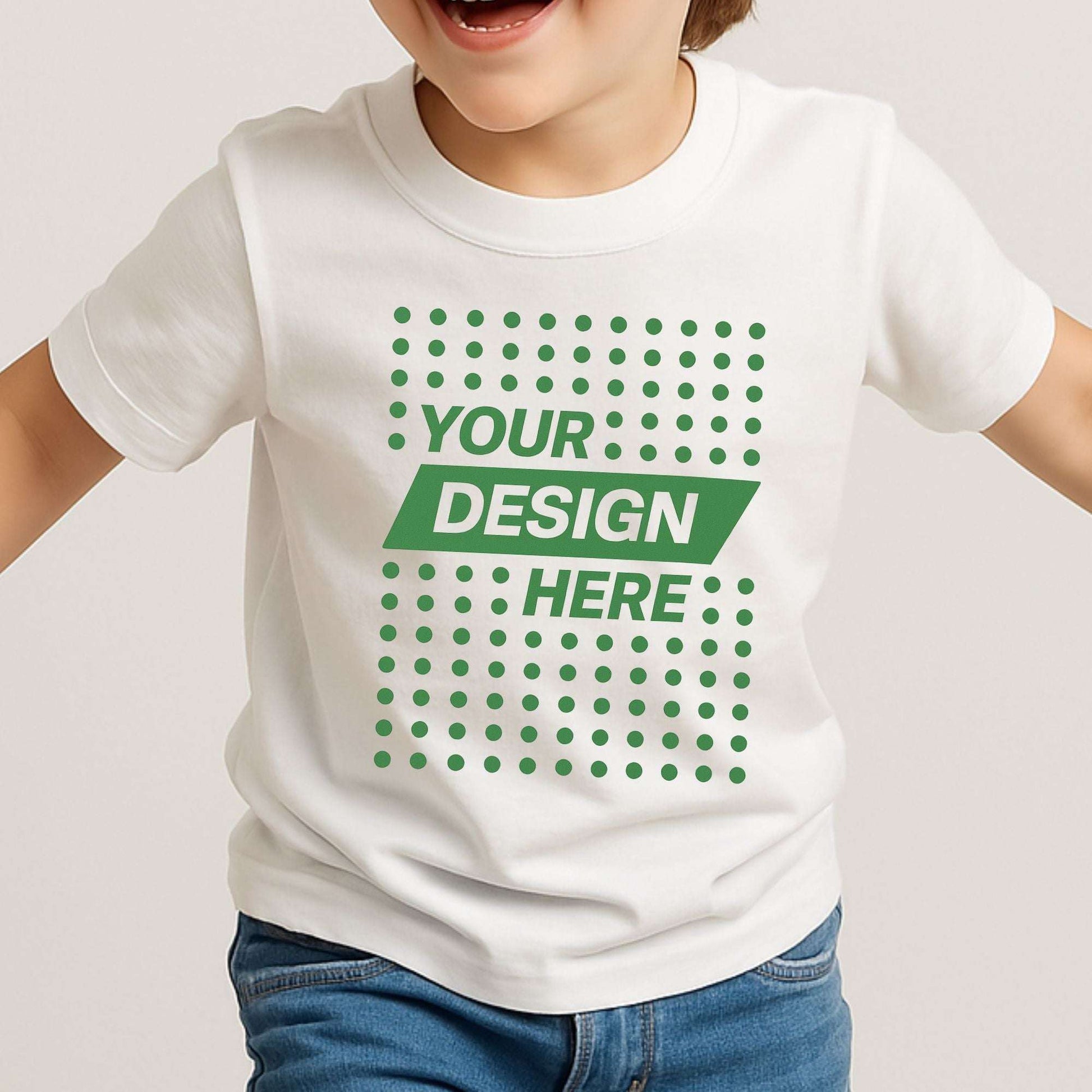Smiling child wearing a white custom T-shirt with "Your Design Here" print – showcasing fun and affordable custom kids’ T-shirts in Canada by CZORZ with design-your-own options